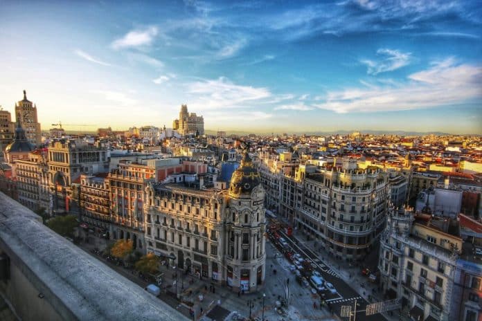 Image of Madrid city centre showing high-rise buildings and streets.