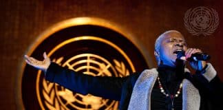 Béninoise singer Angélique Kidjo rehearses in the General Assembly Hall before an all-star concert celebrating the first-ever International Jazz Day. UN Photo/JC McIlwaine