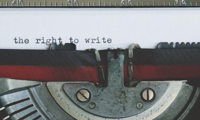 World Press Freedom Day cover image of a typewriter spelling out the right to write
