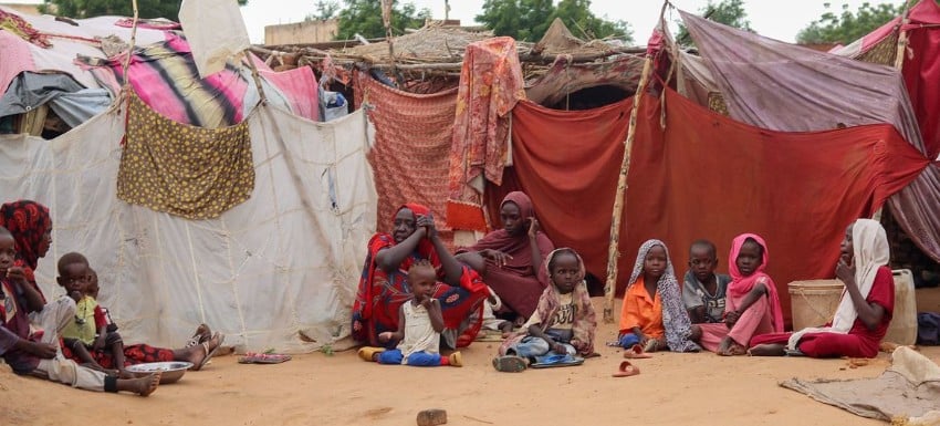 Displaced families shelter at a gathering site in El Fasher in northern Darfur in August 2025.