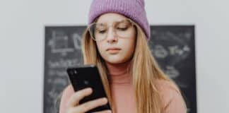 A girld holding a phone