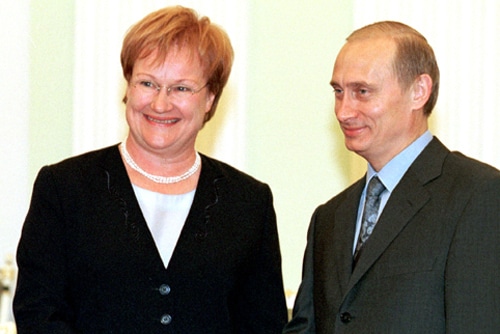 A man and a woman in a formal setting