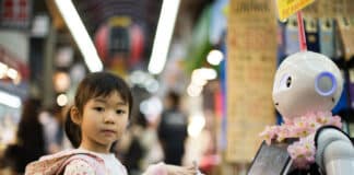 petit fille et un robot intelligence artificielle