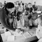 Young school children in a classroom in the village of Cross Roads, South Africa