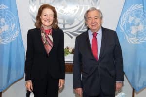 Man and women under UN logo