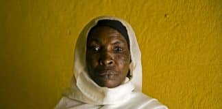 16 June 2010. Seraf Jedad: 4000 people from Abuzair IDP Camp (El Geneina) returned to their village in Seraf Jedad (7km from Chad border) in April 2009. Most of them belong to Arenga tribe and they started to settle down and to restart their business with help from Unamid and Sudanese Government. Their rebuilt the school, open 5 new hand pumps, cultivate new products, reopen the market (with around 30 shops) and reopened the clinic, poorly equiped. In the picture, the nurse Kaltum Beldum Karram in the new clinic. Photo by Albert Gonzalez Farran / Unamid